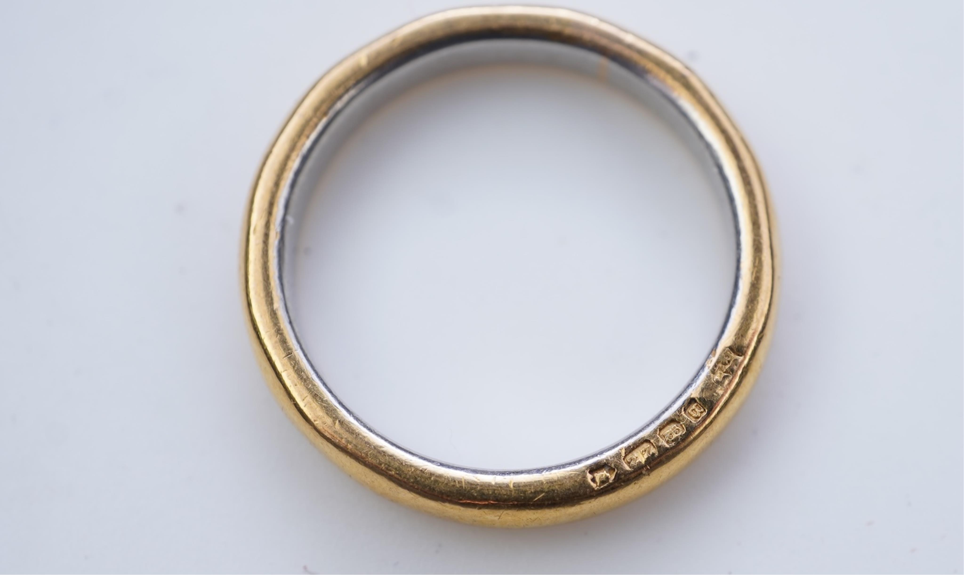 A collection of six gold wedding bands